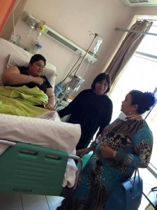 IWOK leaders and members are all Filipino, yet their group does not limit their assistance. Seen here visiting a foreign patient.