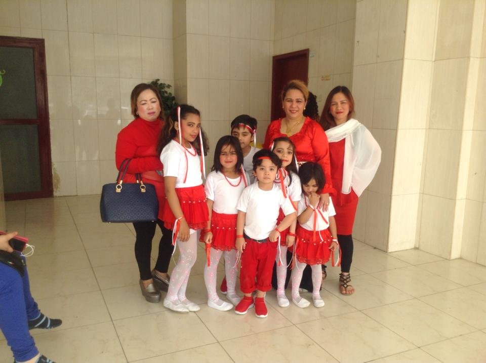 With IWOK family and their children before a performance for charity.